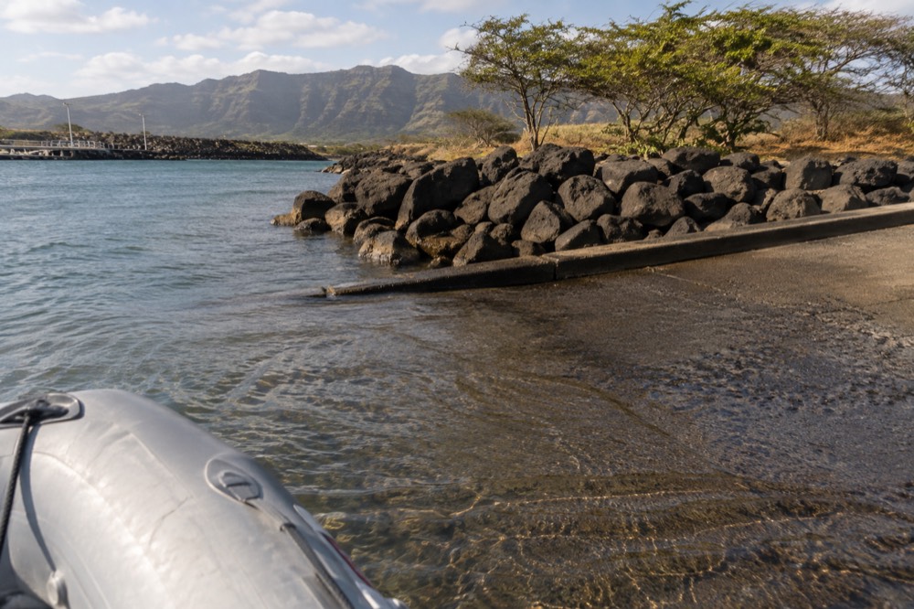 Close on the shallow ramp edge at Kikiaola Small Boat Harbor near Waimea